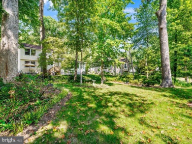 BAY HILLS! At first glance, this may look like your classic on Bay Hills Golf Club in Maryland - for sale on GolfHomes.com, golf home, golf lot