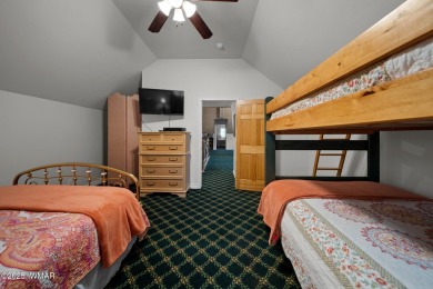 Experience comfort and privacy in this 5-bedroom, 6-bathroom on Pinetop Lakes Country Club in Arizona - for sale on GolfHomes.com, golf home, golf lot
