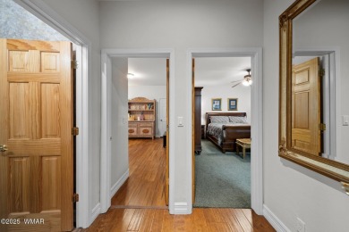 Experience comfort and privacy in this 5-bedroom, 6-bathroom on Pinetop Lakes Country Club in Arizona - for sale on GolfHomes.com, golf home, golf lot