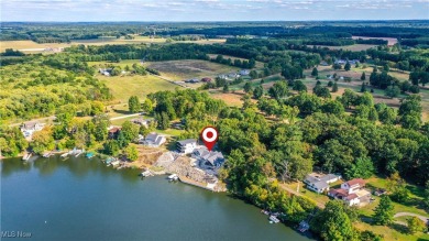 This exceptional, one-of-a-kind lake front property is simply on Lakeside Golf Course in Ohio - for sale on GolfHomes.com, golf home, golf lot