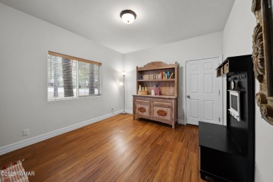 Experience comfort and privacy in this 5-bedroom, 6-bathroom on Pinetop Lakes Country Club in Arizona - for sale on GolfHomes.com, golf home, golf lot