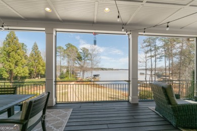 Luxury Lakefront living on Lake Oconee. Located in the gated on The Golf Club at Cuscowilla in Georgia - for sale on GolfHomes.com, golf home, golf lot