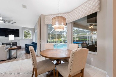 Tucked within the exclusive gated community of Silverthorn, this on Silverthorn Country Club in Florida - for sale on GolfHomes.com, golf home, golf lot