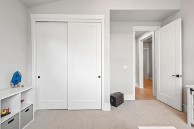 Gracefully situated on a quiet, private lane is this amazing on Rivers Edge Golf Resort in Oregon - for sale on GolfHomes.com, golf home, golf lot