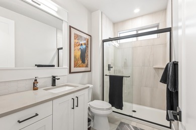 Gracefully situated on a quiet, private lane is this amazing on Rivers Edge Golf Resort in Oregon - for sale on GolfHomes.com, golf home, golf lot