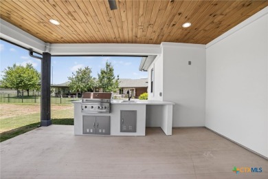 This lovely home is located behind the gates of the Legends on on Legends Golf Course in Texas - for sale on GolfHomes.com, golf home, golf lot