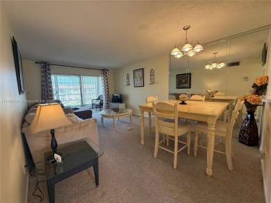 Wonderful well kept condo fully furnished and move in ready on Sunrise Lakes Phase III in Florida - for sale on GolfHomes.com, golf home, golf lot