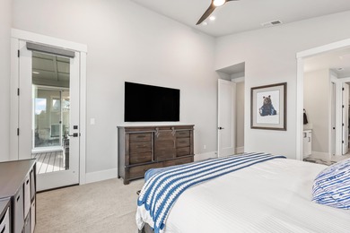 Gracefully situated on a quiet, private lane is this amazing on Rivers Edge Golf Resort in Oregon - for sale on GolfHomes.com, golf home, golf lot