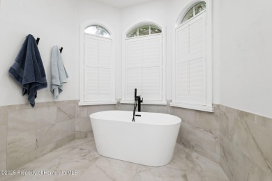 Tucked within the exclusive gated community of Silverthorn, this on Silverthorn Country Club in Florida - for sale on GolfHomes.com, golf home, golf lot