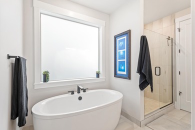 Gracefully situated on a quiet, private lane is this amazing on Rivers Edge Golf Resort in Oregon - for sale on GolfHomes.com, golf home, golf lot