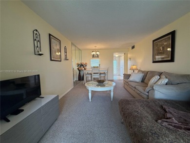 Wonderful well kept condo fully furnished and move in ready on Sunrise Lakes Phase III in Florida - for sale on GolfHomes.com, golf home, golf lot