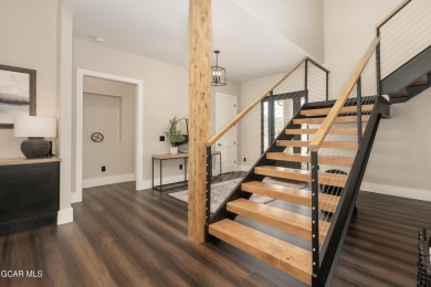 Stunning Custom Home on a Corner Lot with Mountain Views. This on Grand Elk Ranch and Club in Colorado - for sale on GolfHomes.com, golf home, golf lot