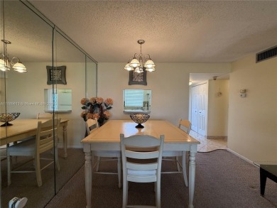 Wonderful well kept condo fully furnished and move in ready on Sunrise Lakes Phase III in Florida - for sale on GolfHomes.com, golf home, golf lot