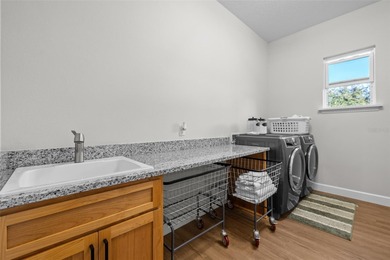 One or more photo(s) has been virtually staged. Discover serene on Wedgefield Golf Club in Florida - for sale on GolfHomes.com, golf home, golf lot