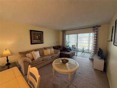 Wonderful well kept condo fully furnished and move in ready on Sunrise Lakes Phase III in Florida - for sale on GolfHomes.com, golf home, golf lot