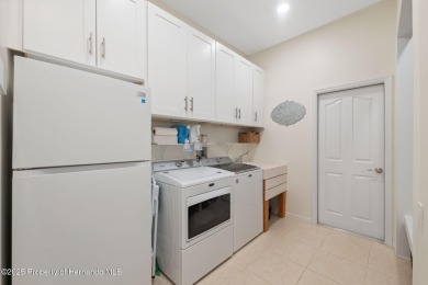 Tucked within the exclusive gated community of Silverthorn, this on Silverthorn Country Club in Florida - for sale on GolfHomes.com, golf home, golf lot