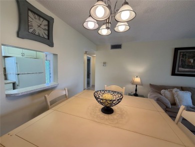 Wonderful well kept condo fully furnished and move in ready on Sunrise Lakes Phase III in Florida - for sale on GolfHomes.com, golf home, golf lot