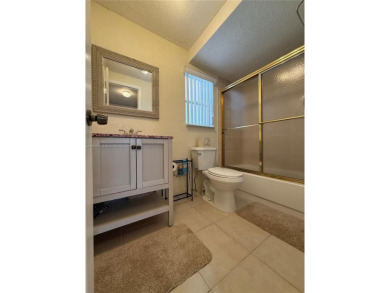 Wonderful well kept condo fully furnished and move in ready on Sunrise Lakes Phase III in Florida - for sale on GolfHomes.com, golf home, golf lot