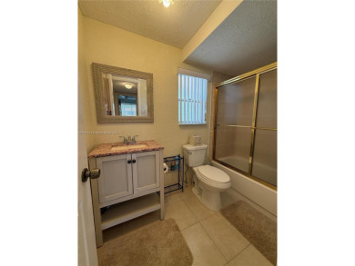 Wonderful well kept condo fully furnished and move in ready on Sunrise Lakes Phase III in Florida - for sale on GolfHomes.com, golf home, golf lot