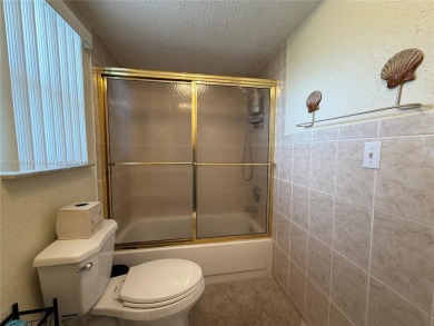 Wonderful well kept condo fully furnished and move in ready on Sunrise Lakes Phase III in Florida - for sale on GolfHomes.com, golf home, golf lot