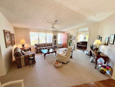 If you're looking for a beautifully maintained, move-in-ready on Pine Lakes Country Club in Florida - for sale on GolfHomes.com, golf home, golf lot