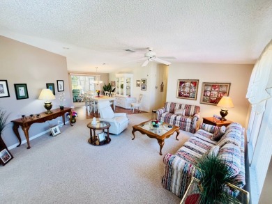If you're looking for a beautifully maintained, move-in-ready on Pine Lakes Country Club in Florida - for sale on GolfHomes.com, golf home, golf lot