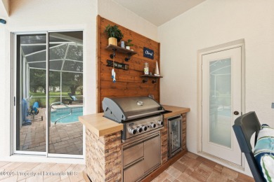 Tucked within the exclusive gated community of Silverthorn, this on Silverthorn Country Club in Florida - for sale on GolfHomes.com, golf home, golf lot