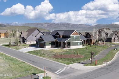 Stunning Custom Home on a Corner Lot with Mountain Views. This on Grand Elk Ranch and Club in Colorado - for sale on GolfHomes.com, golf home, golf lot