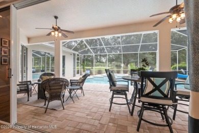 Tucked within the exclusive gated community of Silverthorn, this on Silverthorn Country Club in Florida - for sale on GolfHomes.com, golf home, golf lot
