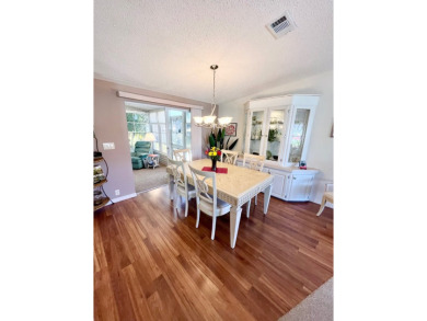 If you're looking for a beautifully maintained, move-in-ready on Pine Lakes Country Club in Florida - for sale on GolfHomes.com, golf home, golf lot