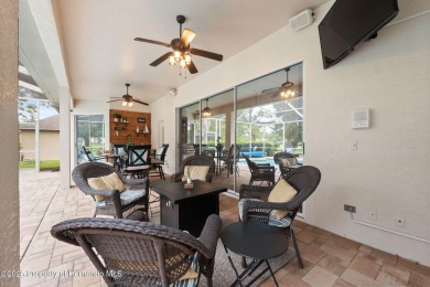 Tucked within the exclusive gated community of Silverthorn, this on Silverthorn Country Club in Florida - for sale on GolfHomes.com, golf home, golf lot