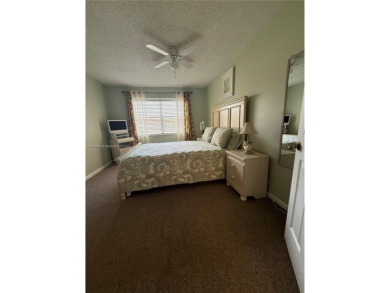 Wonderful well kept condo fully furnished and move in ready on Sunrise Lakes Phase III in Florida - for sale on GolfHomes.com, golf home, golf lot