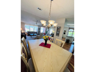 If you're looking for a beautifully maintained, move-in-ready on Pine Lakes Country Club in Florida - for sale on GolfHomes.com, golf home, golf lot