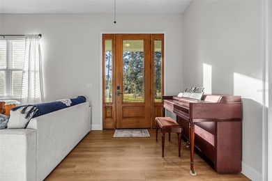 One or more photo(s) has been virtually staged. Discover serene on Wedgefield Golf Club in Florida - for sale on GolfHomes.com, golf home, golf lot