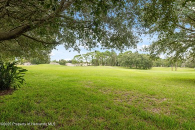 Tucked within the exclusive gated community of Silverthorn, this on Silverthorn Country Club in Florida - for sale on GolfHomes.com, golf home, golf lot