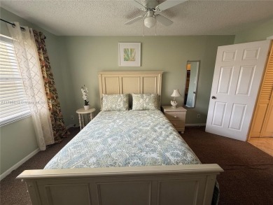 Wonderful well kept condo fully furnished and move in ready on Sunrise Lakes Phase III in Florida - for sale on GolfHomes.com, golf home, golf lot
