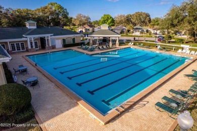 Tucked within the exclusive gated community of Silverthorn, this on Silverthorn Country Club in Florida - for sale on GolfHomes.com, golf home, golf lot