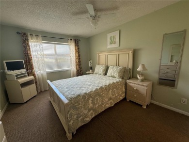 Wonderful well kept condo fully furnished and move in ready on Sunrise Lakes Phase III in Florida - for sale on GolfHomes.com, golf home, golf lot