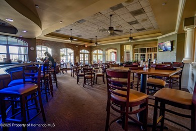 Tucked within the exclusive gated community of Silverthorn, this on Silverthorn Country Club in Florida - for sale on GolfHomes.com, golf home, golf lot