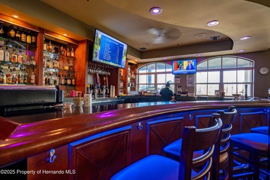 Tucked within the exclusive gated community of Silverthorn, this on Silverthorn Country Club in Florida - for sale on GolfHomes.com, golf home, golf lot