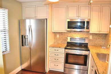 Beautiful 2BR/2BA condo with gorgeous golf course views. Bright on Colony West Country Club in Florida - for sale on GolfHomes.com, golf home, golf lot