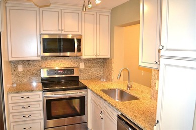 Beautiful 2BR/2BA condo with gorgeous golf course views. Bright on Colony West Country Club in Florida - for sale on GolfHomes.com, golf home, golf lot