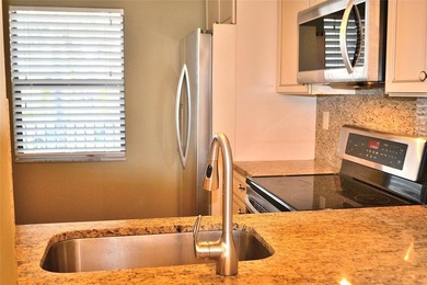 Beautiful 2BR/2BA condo with gorgeous golf course views. Bright on Colony West Country Club in Florida - for sale on GolfHomes.com, golf home, golf lot