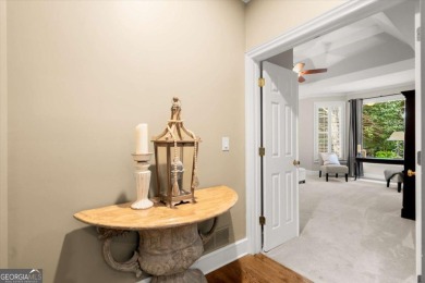 Experience resort-style living perfectly positioned on a private on Woodmont Golf and Country Club in Georgia - for sale on GolfHomes.com, golf home, golf lot