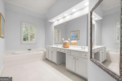 Experience resort-style living perfectly positioned on a private on Woodmont Golf and Country Club in Georgia - for sale on GolfHomes.com, golf home, golf lot