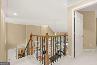 Experience resort-style living perfectly positioned on a private on Woodmont Golf and Country Club in Georgia - for sale on GolfHomes.com, golf home, golf lot