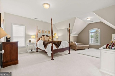 Experience resort-style living perfectly positioned on a private on Woodmont Golf and Country Club in Georgia - for sale on GolfHomes.com, golf home, golf lot