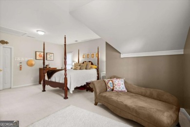 Experience resort-style living perfectly positioned on a private on Woodmont Golf and Country Club in Georgia - for sale on GolfHomes.com, golf home, golf lot