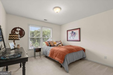 Experience resort-style living perfectly positioned on a private on Woodmont Golf and Country Club in Georgia - for sale on GolfHomes.com, golf home, golf lot