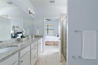 Experience the pinnacle of lakefront living in the heart of on Sarasota National Golf Club in Florida - for sale on GolfHomes.com, golf home, golf lot